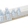 metal figures sat on a wooden box